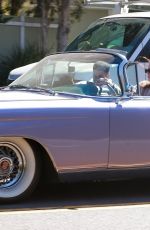 KENDALL JENNER in Her Purple 1960 Cadillac Eldorado Convertible Driving Out in Los Angeles 03/18/2020