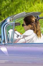 KENDALL JENNER in Her Purple 1960 Cadillac Eldorado Convertible Driving Out in Los Angeles 03/18/2020