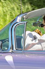 KENDALL JENNER in Her Purple 1960 Cadillac Eldorado Convertible Driving Out in Los Angeles 03/18/2020