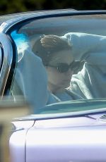 KENDALL JENNER in Her Purple 1960 Cadillac Eldorado Convertible Driving Out in Los Angeles 03/18/2020