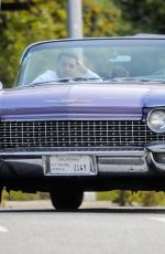 KENDALL JENNER in Her Purple 1960 Cadillac Eldorado Convertible Driving Out in Los Angeles 03/18/2020