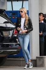KIMBERLY STEWART in Leather Jacket and Denim at a Gas Station in Beverly Hills 03/05/2020