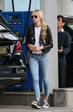 KIMBERLY STEWART in Leather Jacket and Denim at a Gas Station in Beverly Hills 03/05/2020