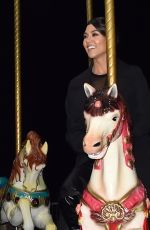 KOURTNEY KARDASHIA Riding on a Carousel in Paris 03/02/2020