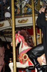 KOURTNEY KARDASHIA Riding on a Carousel in Paris 03/02/2020