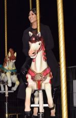 KOURTNEY KARDASHIA Riding on a Carousel in Paris 03/02/2020