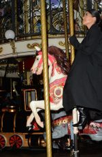 KOURTNEY KARDASHIA Riding on a Carousel in Paris 03/02/2020