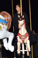 KOURTNEY KARDASHIA Riding on a Carousel in Paris 03/02/2020