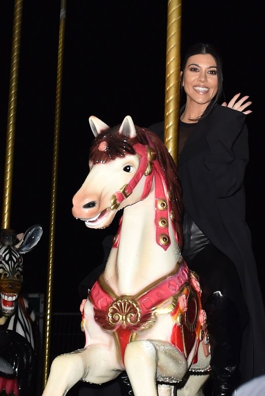 KOURTNEY KARDASHIA Riding on a Carousel in Paris 03/02/2020