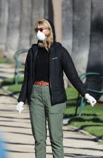 LAURA DERN Wears Mask and Gloves Out with Her Dog in Los Angeles 03/25/2020