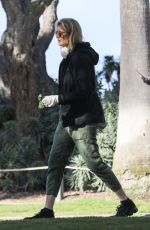 LAURA DERN Wears Mask and Gloves Out with Her Dog in Los Angeles 03/25/2020