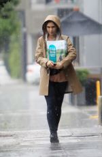 LILY COLLINS Out in the Rain to Pick Up Dog Food in Los Angeles 03/13/2020