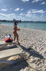 LIZIANE GUTIERREZ in Bikini Wears Mask and Rubber Gloves at a Beach in Mexico 03/28/2020