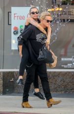 MILEY CYRUS and Cody Simpson Out in Malibu 03/02/2020
