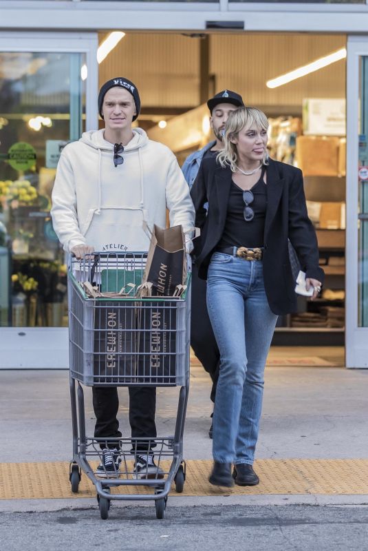 MILEY CYRUS and Cody Simpson Out Shopping in Los Angeles 02/28/2020