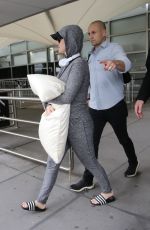 Pregnant KATTY PERRY Hides Her Baby Bump at Melbourne Airport 03/06/2020