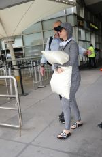 Pregnant KATTY PERRY Hides Her Baby Bump at Melbourne Airport 03/06/2020