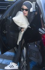 Pregnant KATY PERRY Arrives at Airport in Sydney 03/12/2020
