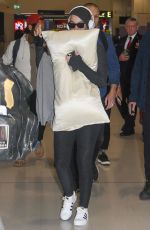 Pregnant KATY PERRY Arrives at Airport in Sydney 03/12/2020