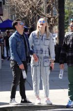 Pregnant SOPHIE TURNER in a Washed Out Denim Jumpsuit Out wioth Joe Jonas in Los Angeles 03/03/2020