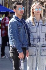 Pregnant SOPHIE TURNER in a Washed Out Denim Jumpsuit Out wioth Joe Jonas in Los Angeles 03/03/2020