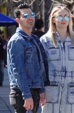 Pregnant SOPHIE TURNER in a Washed Out Denim Jumpsuit Out wioth Joe Jonas in Los Angeles 03/03/2020