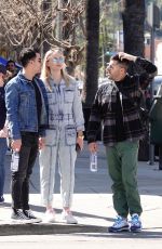 Pregnant SOPHIE TURNER in a Washed Out Denim Jumpsuit Out wioth Joe Jonas in Los Angeles 03/03/2020