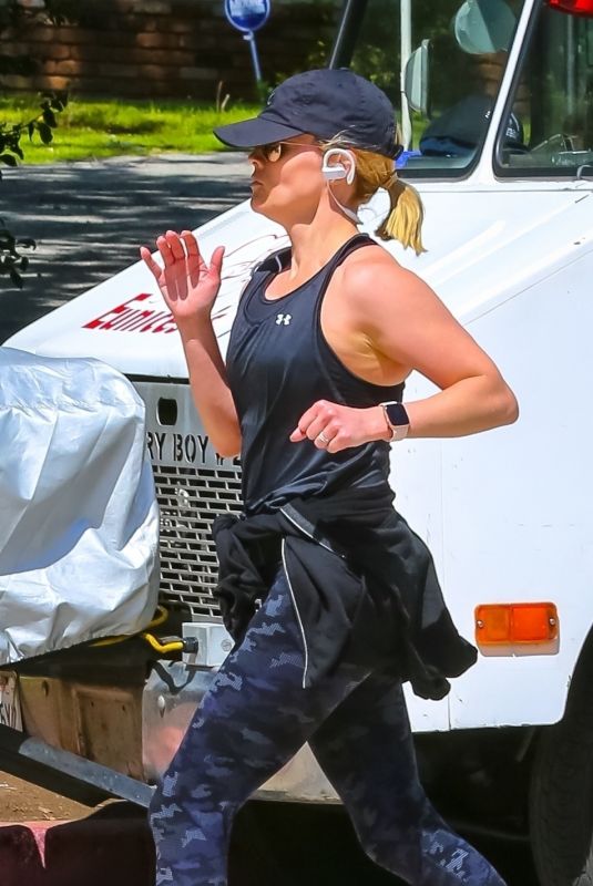 REESE WITHERSPOON Out Jogging in Brentwood 03/23/2020