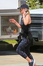 REESE WITHERSPOON Out Jogging in Brentwood 03/23/2020
