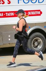REESE WITHERSPOON Out Jogging in Brentwood 03/23/2020