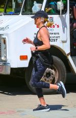REESE WITHERSPOON Out Jogging in Brentwood 03/23/2020
