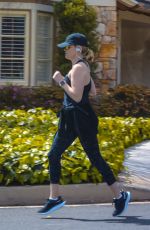 REESE WITHERSPOON Out Jogging in Brentwood 03/23/2020