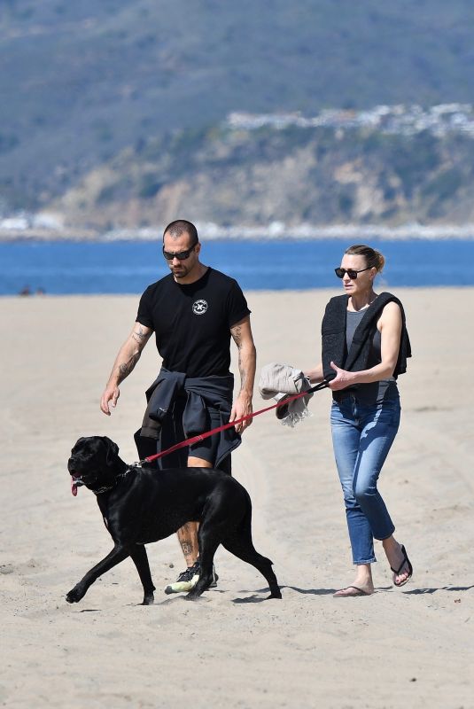 ROBIN WRGHT and Clement Giraudet Out with Their Dog on the Beach in Santa Monica 03/24/2020