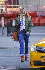 SIENNA MILLER in Denim Shows a Diamond Rring Out in New York 03/11/2020