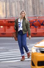 SIENNA MILLER in Denim Shows a Diamond Rring Out in New York 03/11/2020