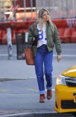 SIENNA MILLER in Denim Shows a Diamond Rring Out in New York 03/11/2020