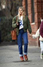 SIENNA MILLER in Denim Shows a Diamond Rring Out in New York 03/11/2020