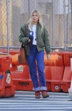 SIENNA MILLER in Denim Shows a Diamond Rring Out in New York 03/11/2020