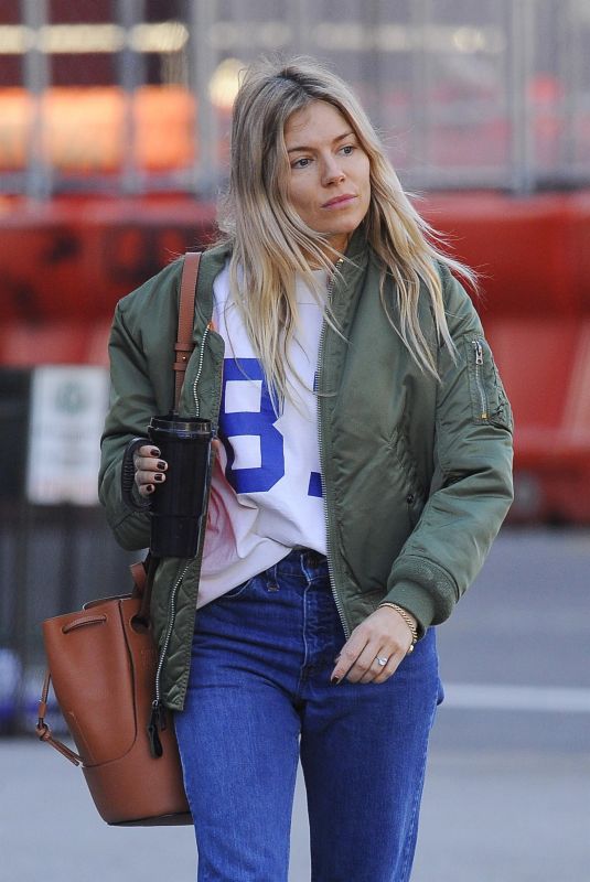 SIENNA MILLER in Denim Shows a Diamond Rring Out in New York 03/11/2020
