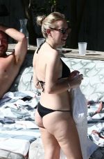 TANYA BURR in Bikini at a Pool in Miami 03/11/2020