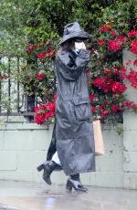 VANESSA HUDGENS Braves the Rain while Out for Coffee in Los Feliz 03/12/2020