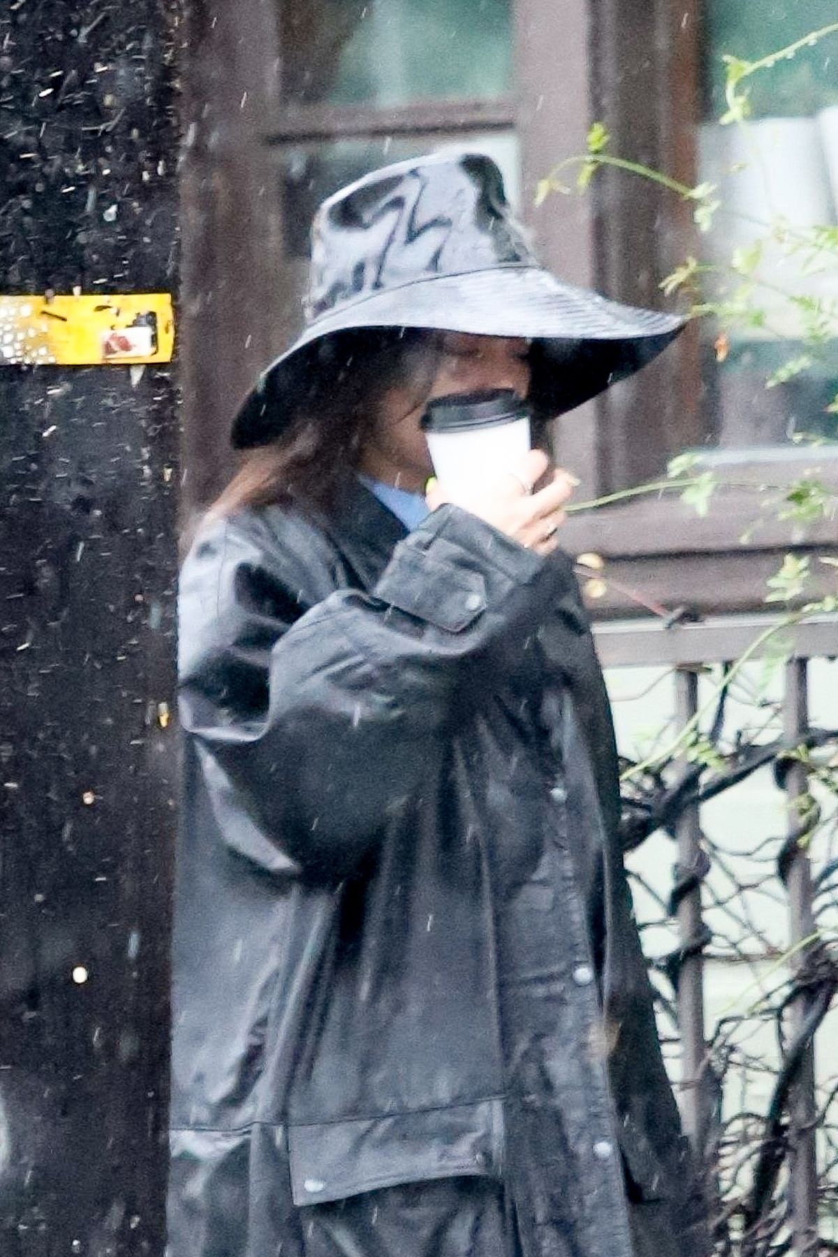 VANESSA HUDGENS Braves the Rain while Out for Coffee in Los Feliz 03/12 ...