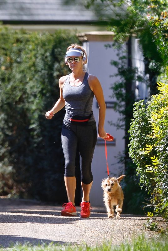 AMANDA HOLDEN in Leggings Out Jogging with Her Dog in London 04/20/2020