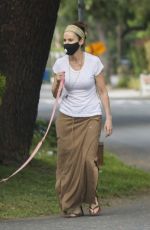 AMY BRENNEMAN Wearing Mask Out with Her Dog in Beverly Hills 04/29/2020