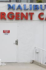 APRIL LOVE GEARY Wearing Mask Leaves Urgent Care in Malibu 04/16/2020