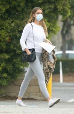 APRIL LOVE GEARY Wearing Mask Leaves Urgent Care in Malibu 04/16/2020