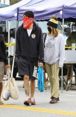 ASHLEY TISDALE and Christopher French Wearing Masks Shopping at Farmer