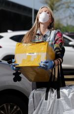 CAPRICE BOURRET Drops off Care Packages for NHS Staff at Hammersmith Hospital in London 04/16/2020