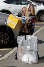 CAPRICE BOURRET Drops off Care Packages for NHS Staff at Hammersmith Hospital in London 04/16/2020