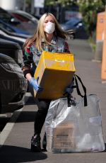 CAPRICE BOURRET Drops off Care Packages for NHS Staff at Hammersmith Hospital in London 04/16/2020